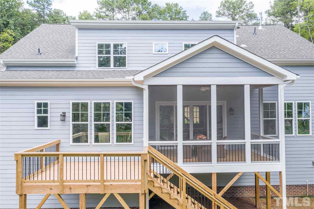 11007 Crest Mist Circle Raleigh, NC 27613 - Photo 27 of 30 A view of the rear of the home.