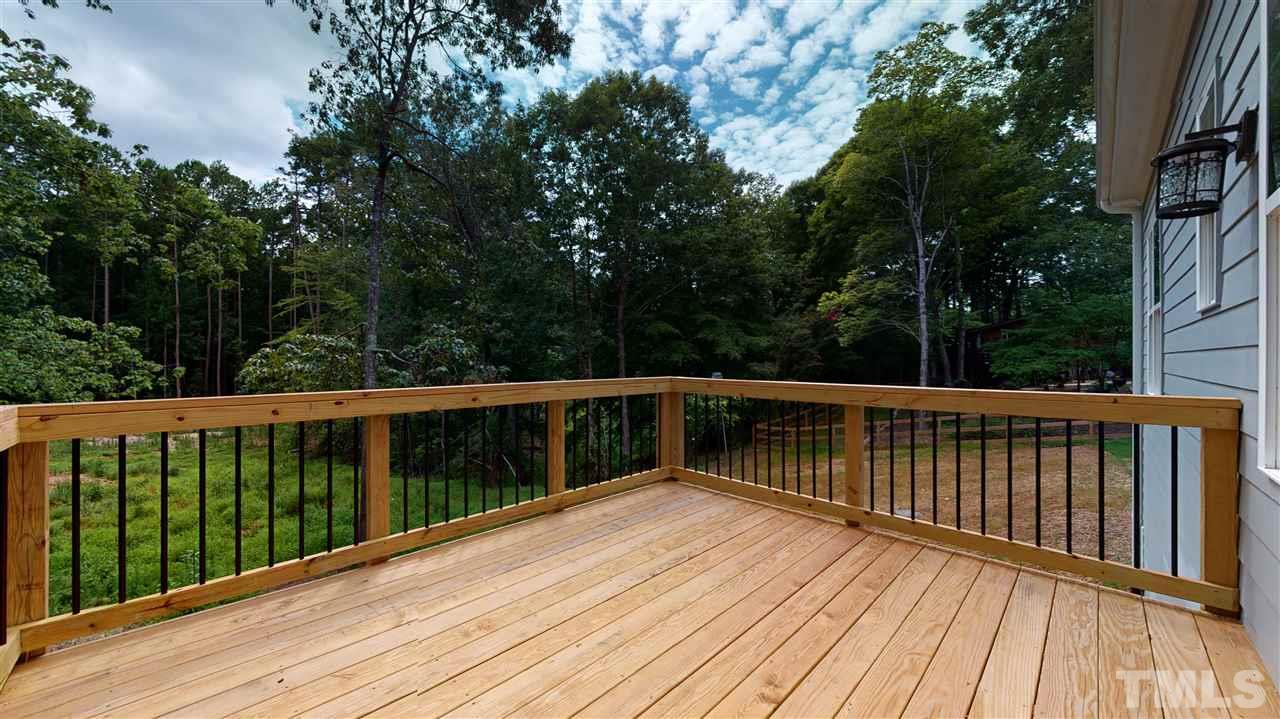 11007 Crest Mist Circle Raleigh, NC 27613 - Photo 28 of 30 The deck overlooking the backyard.