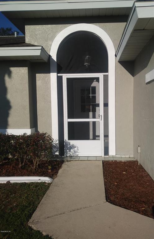 46 Hickory Loop Ocala, FL 34472 - Photo 4 of 71 Screen Enclosed Entry Way