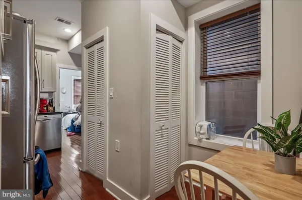 a view of a room that has a bench in it