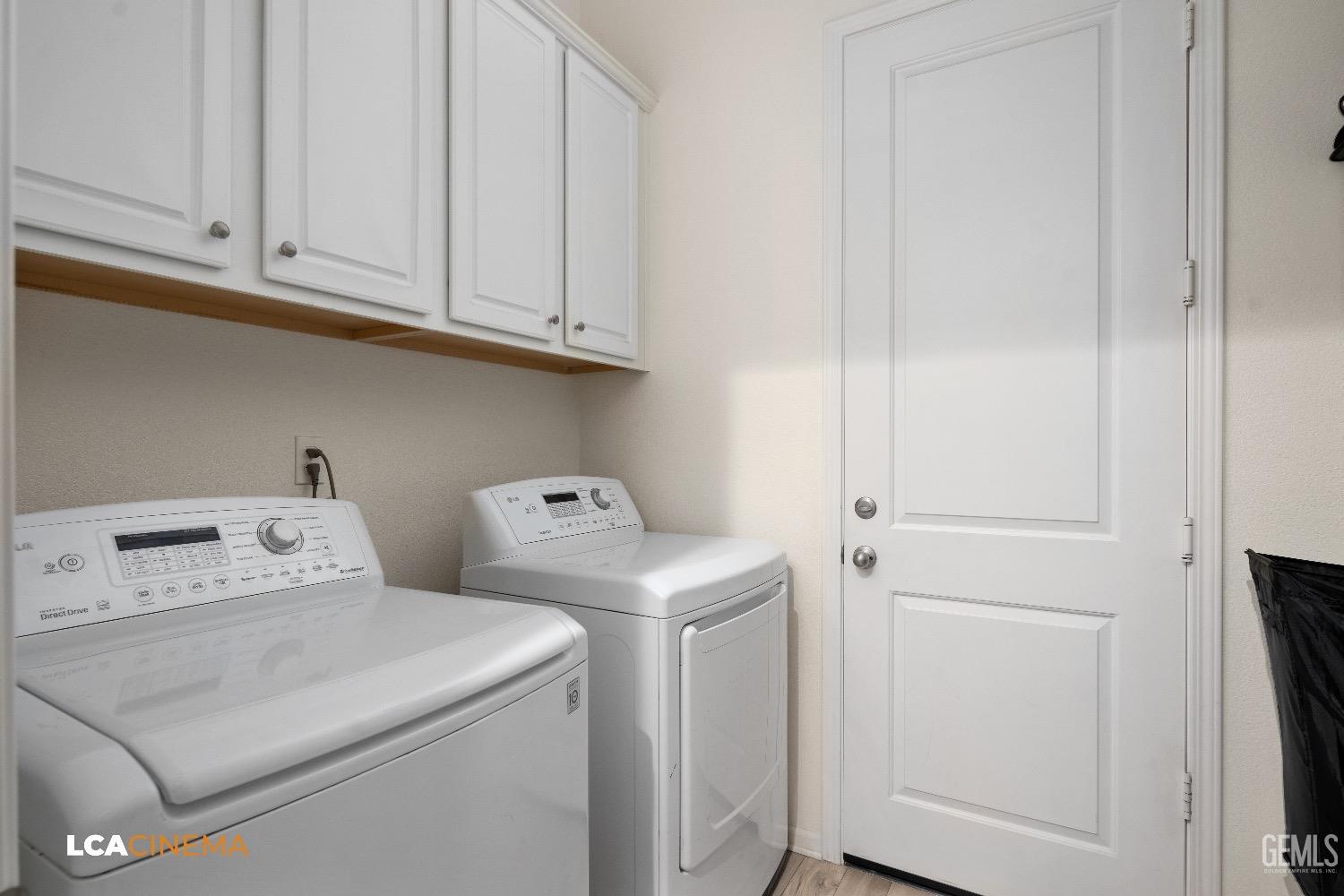 Undisclosed Address Bakersfield, CA 93314 - Photo 16 of 29 a utility room with dryer and washer