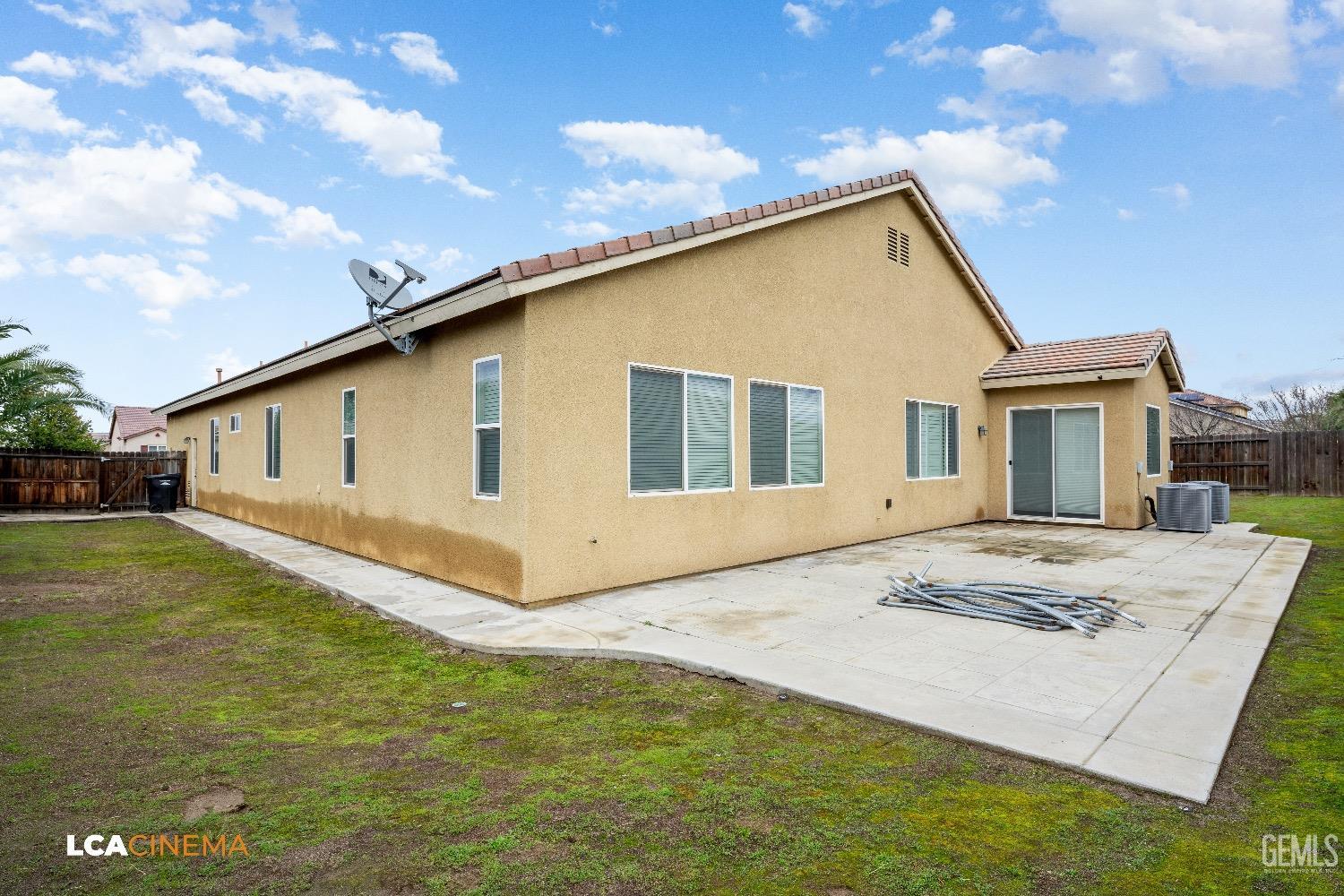 Undisclosed Address Bakersfield, CA 93314 - Photo 29 of 29 a view of a house with a yard