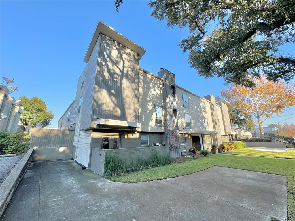 4224 Rawlins Street, Unit 2 Dallas, TX 75219 - Photo 1 of 1 a view of a building with a yard