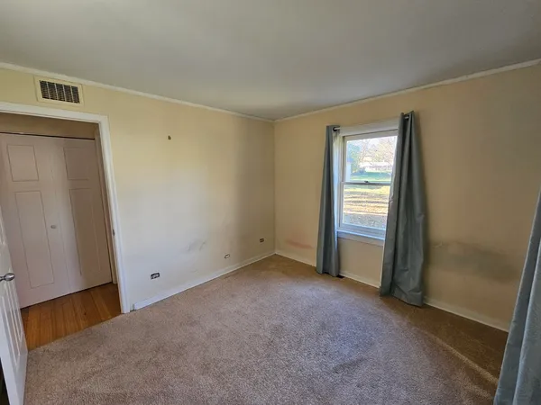 an empty room with windows