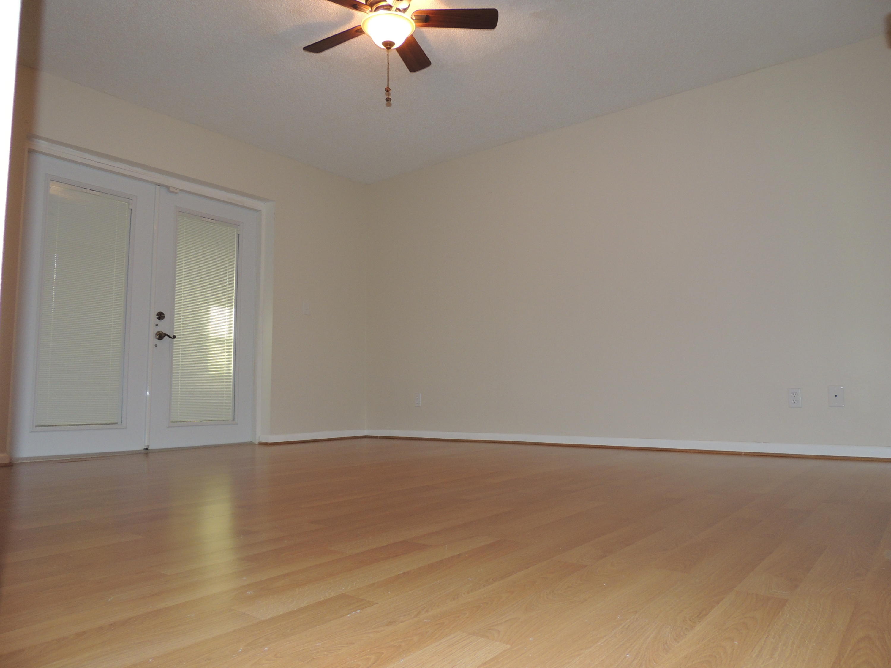 1829 Abbey Road West Palm Beach, FL 33415 - Photo 12 of 15 a view of an empty room with a chandelier fan