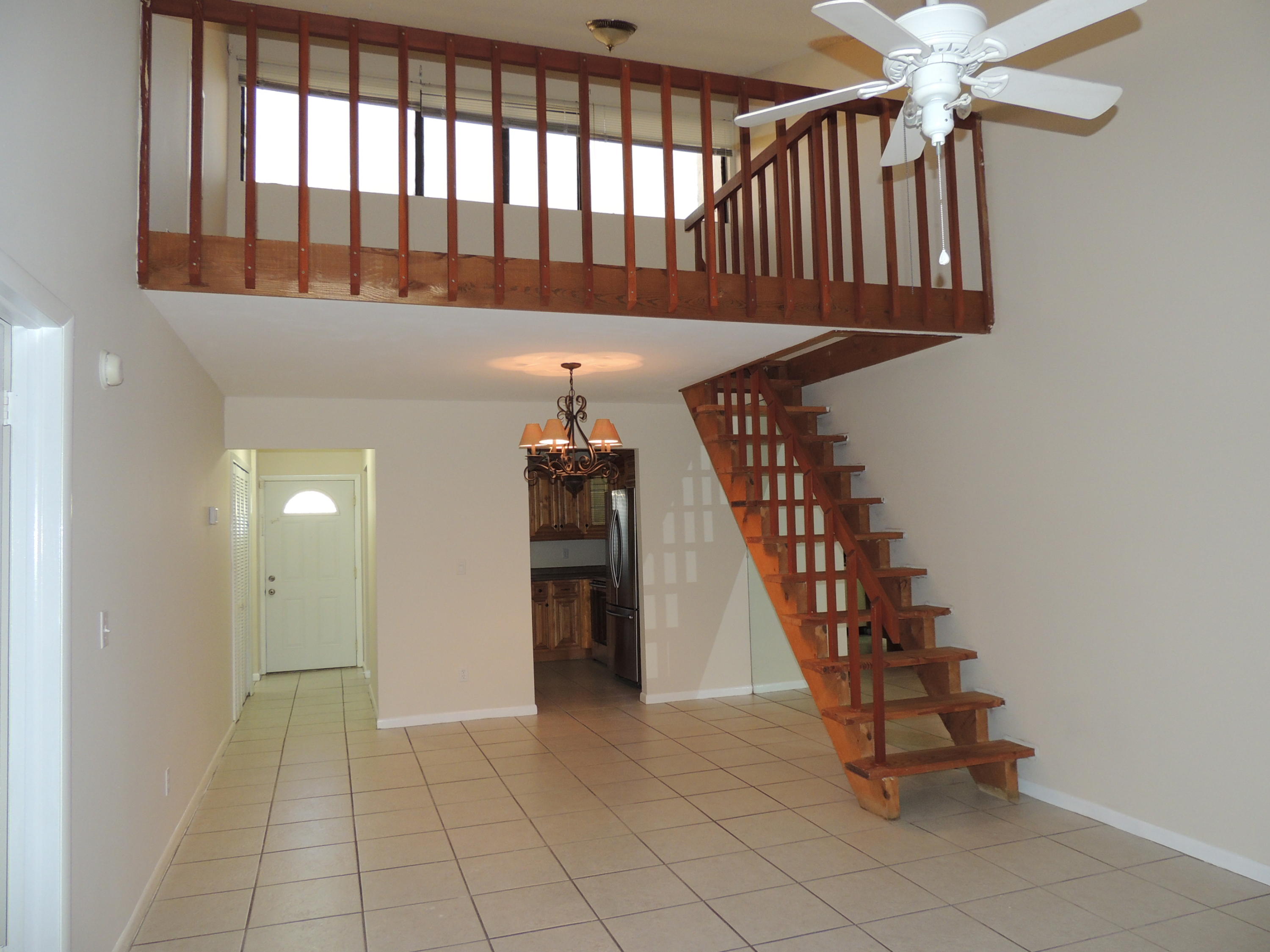 1829 Abbey Road West Palm Beach, FL 33415 - Photo 9 of 15 a view of entryway with stairs and wooden floor