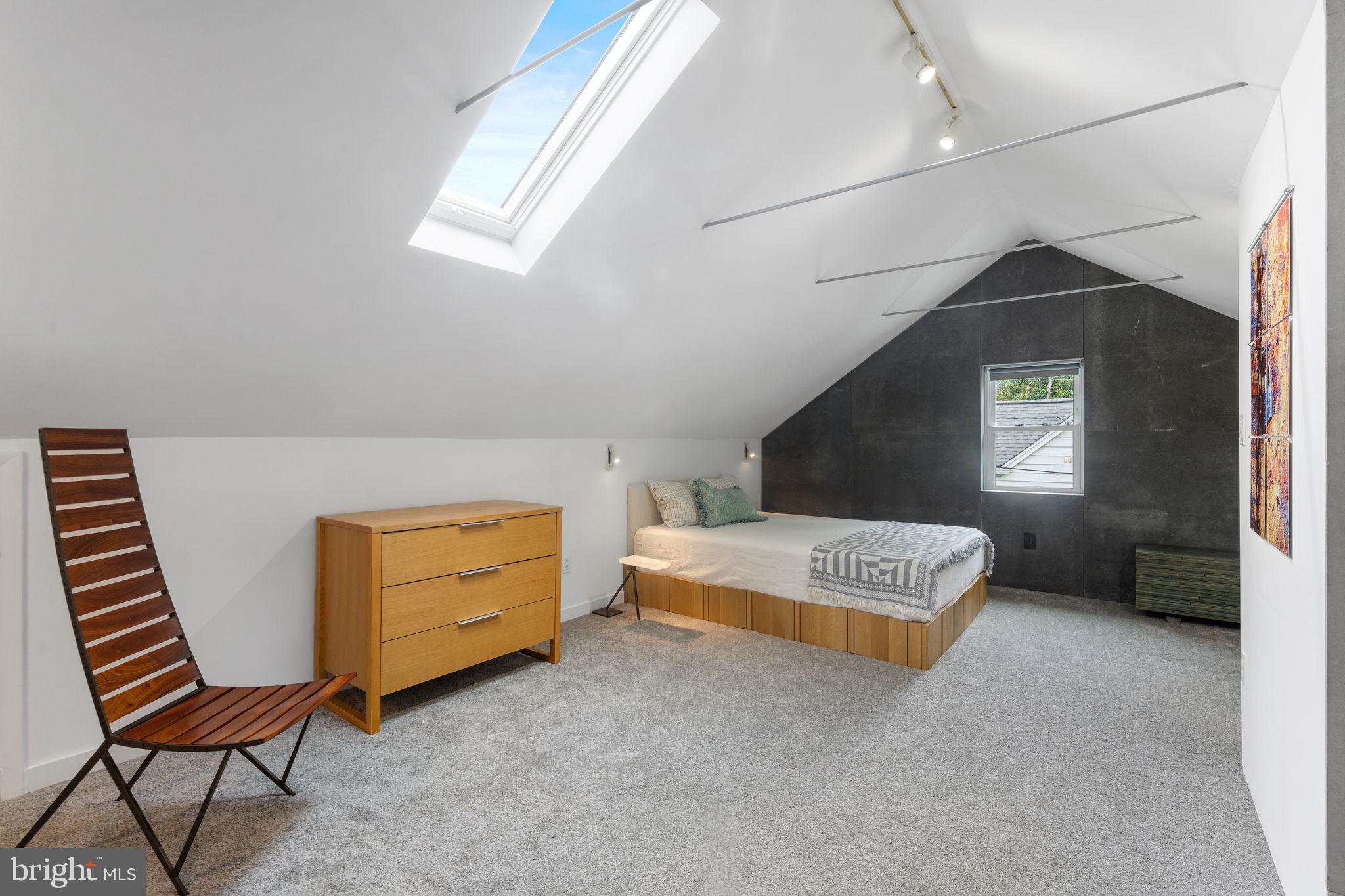 5807 Taylor Road Riverdale, MD 20737 - Photo 28 of 66 a living room with furniture and a window