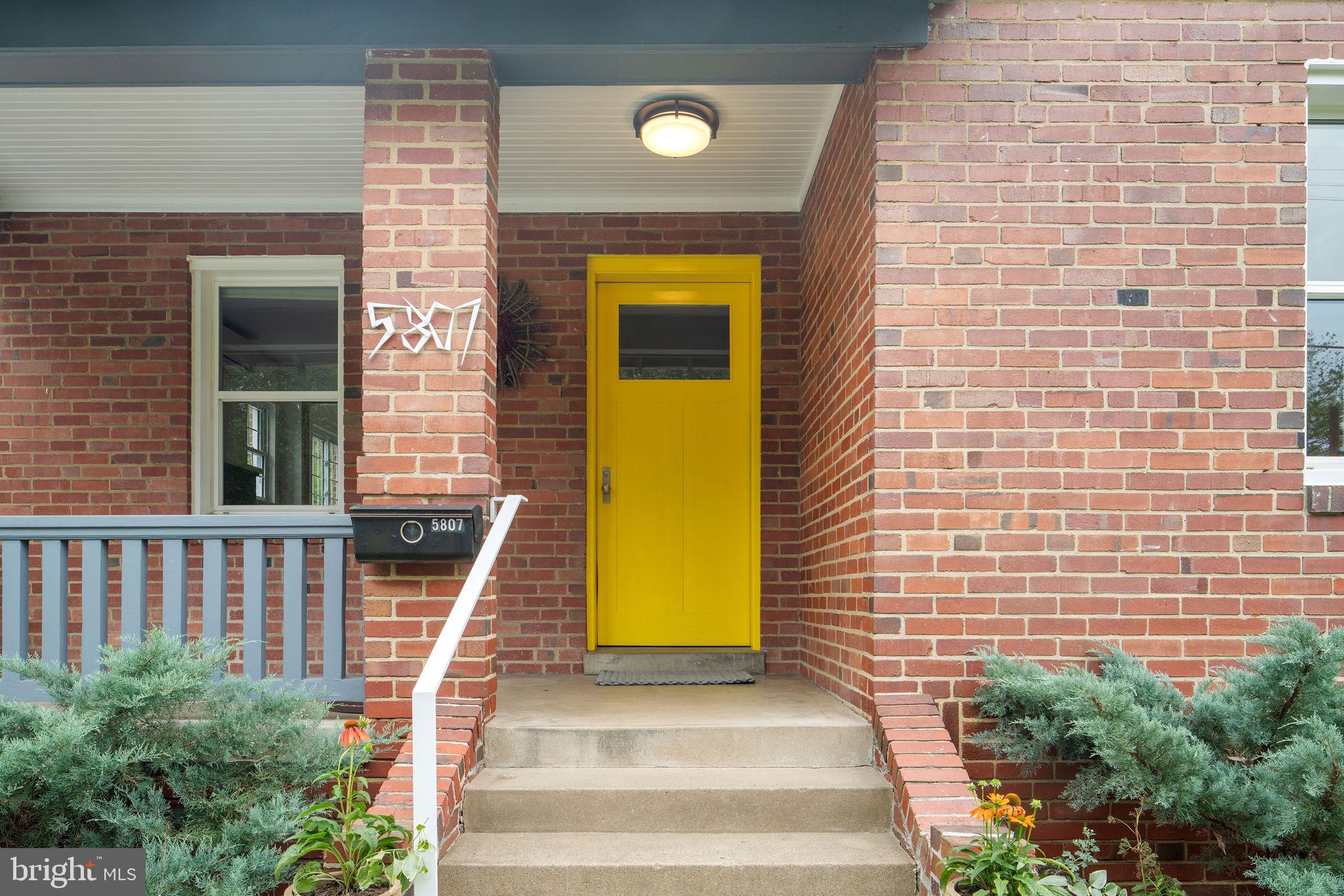 5807 Taylor Road Riverdale, MD 20737 - Photo 3 of 66 a front view of a house with a garden