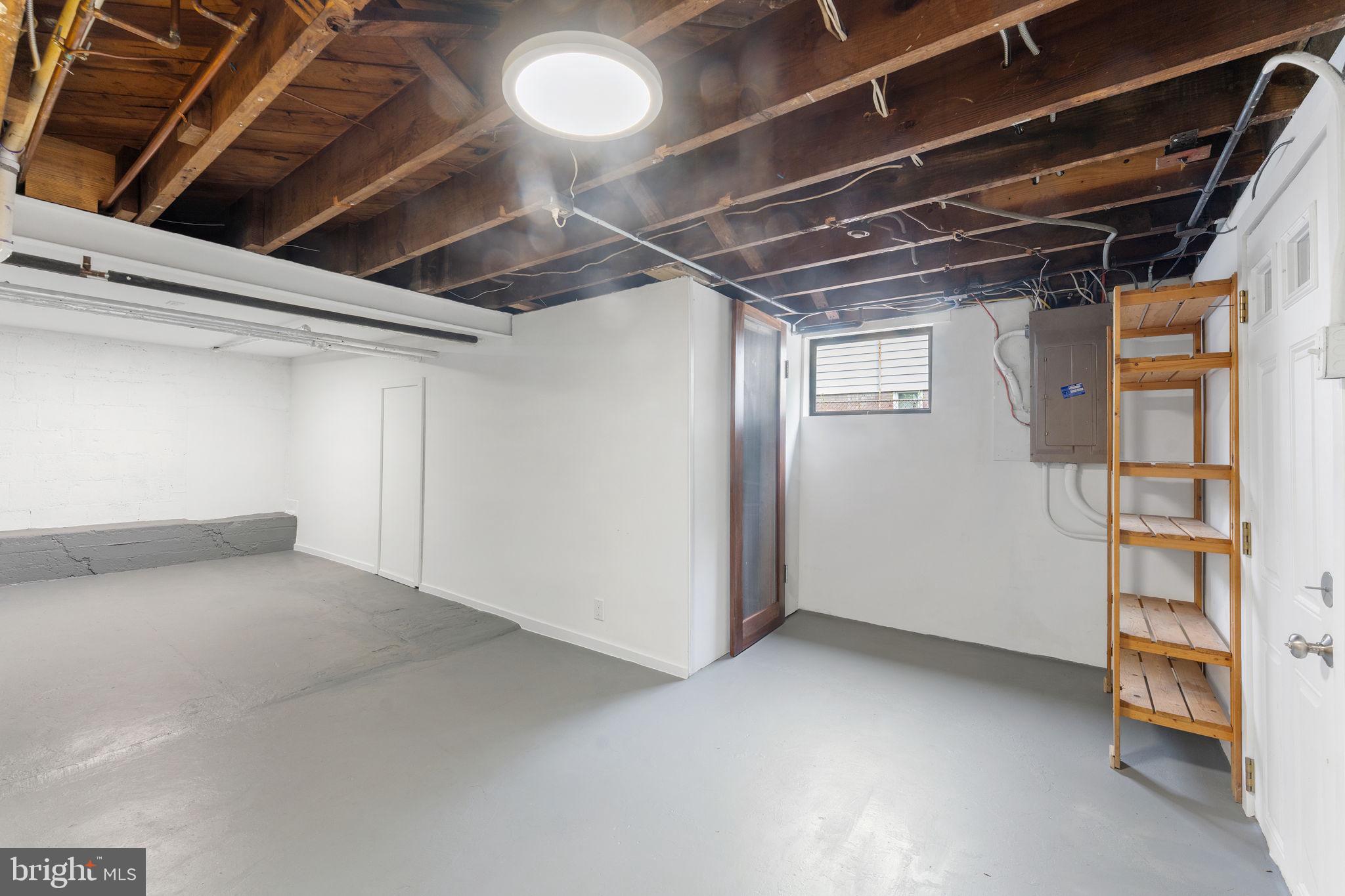5807 Taylor Road Riverdale, MD 20737 - Photo 39 of 66 a view of an empty room with a garage