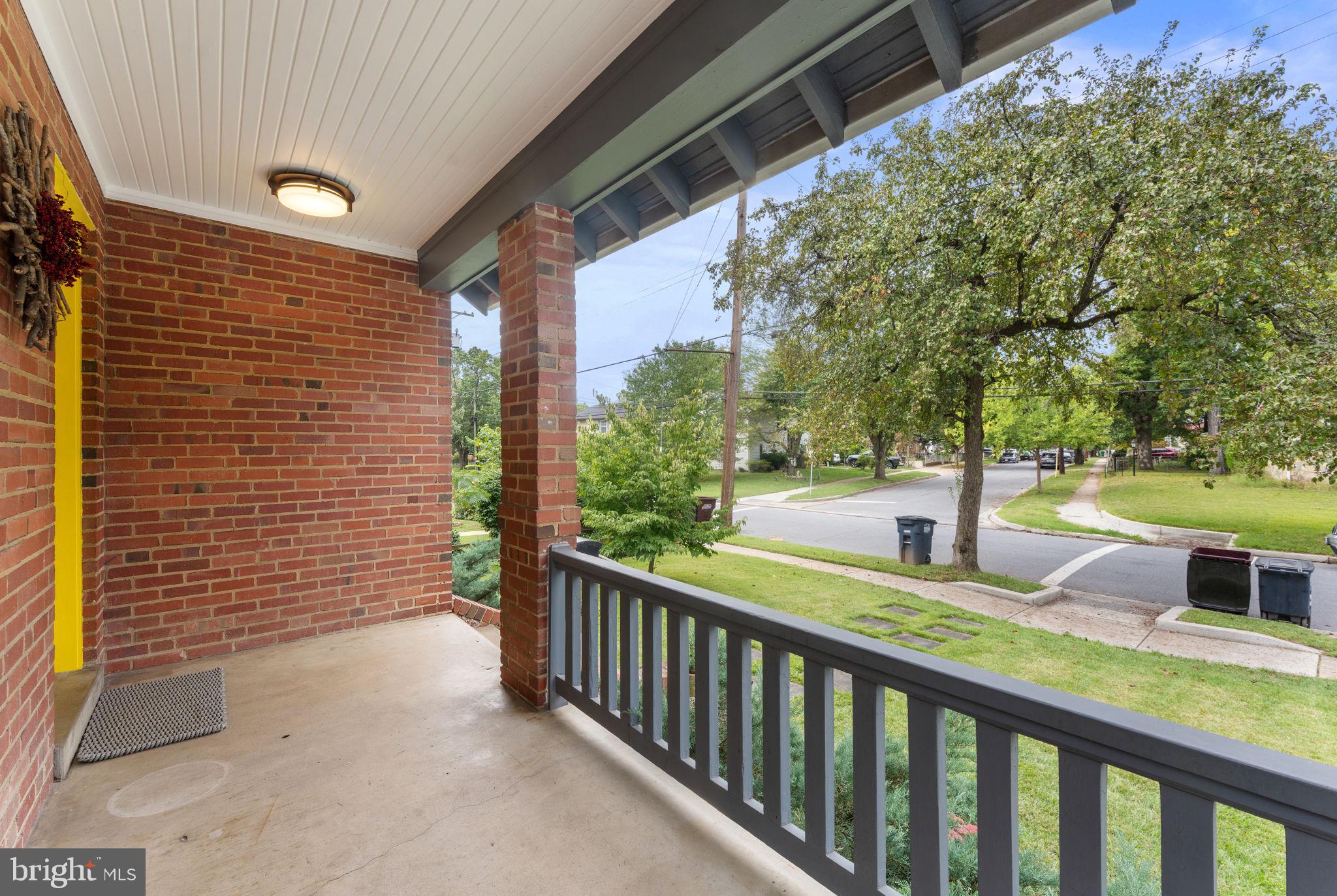 5807 Taylor Road Riverdale, MD 20737 - Photo 4 of 66 a view of a porch with wooden floor and fence