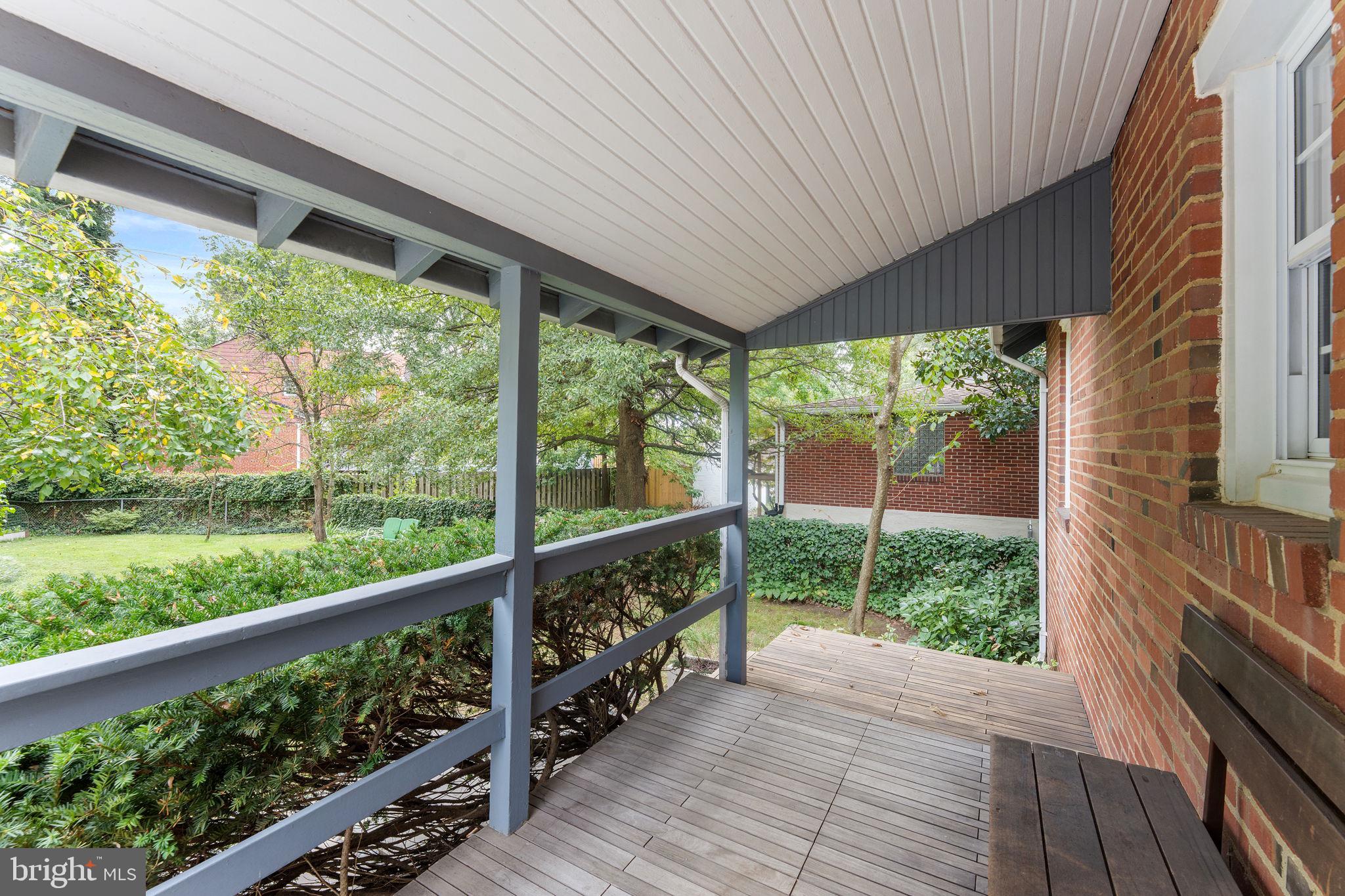 5807 Taylor Road Riverdale, MD 20737 - Photo 42 of 66 a view of balcony with wooden floor