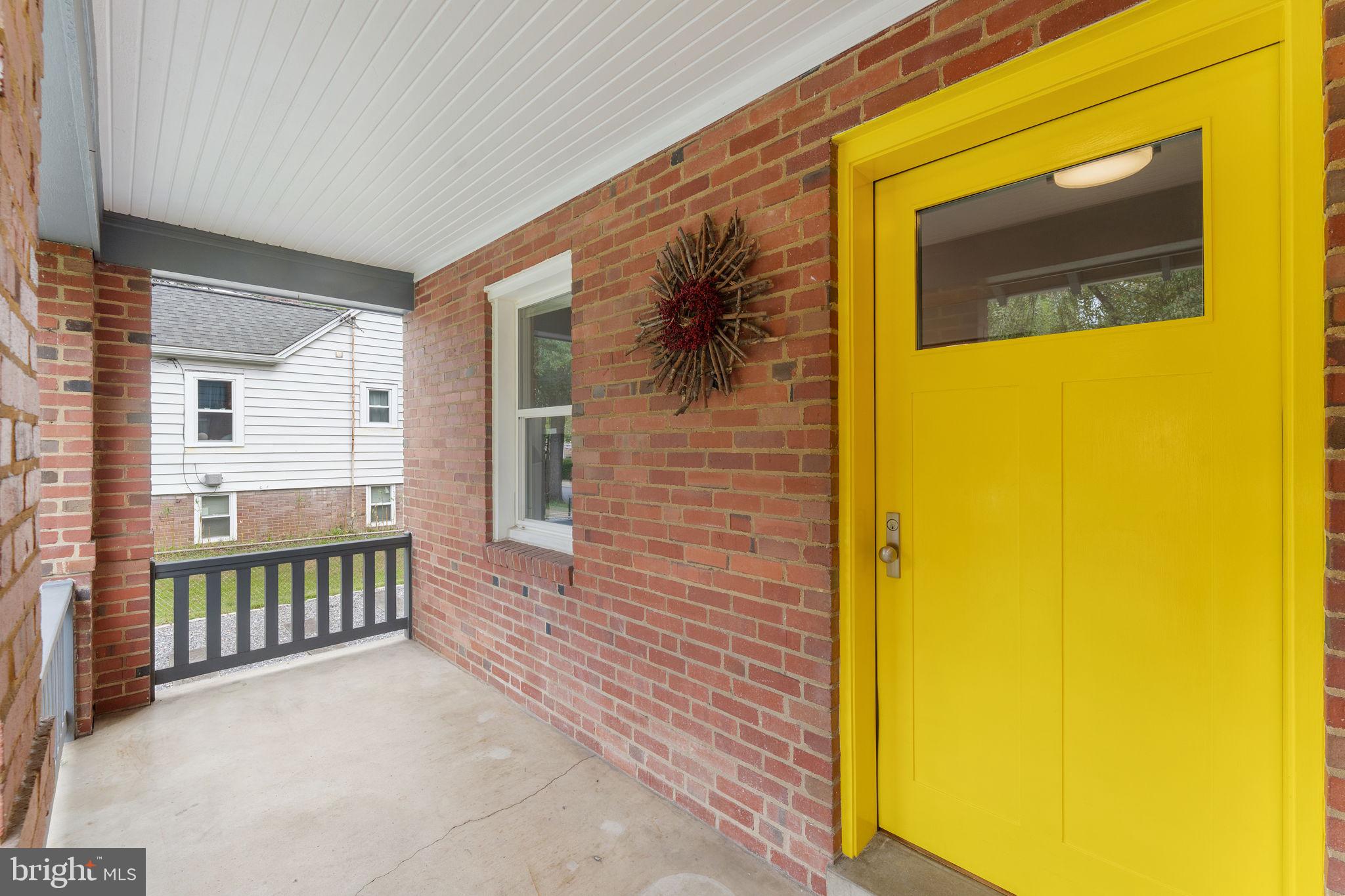 5807 Taylor Road Riverdale, MD 20737 - Photo 5 of 66 a view of a porch with a door