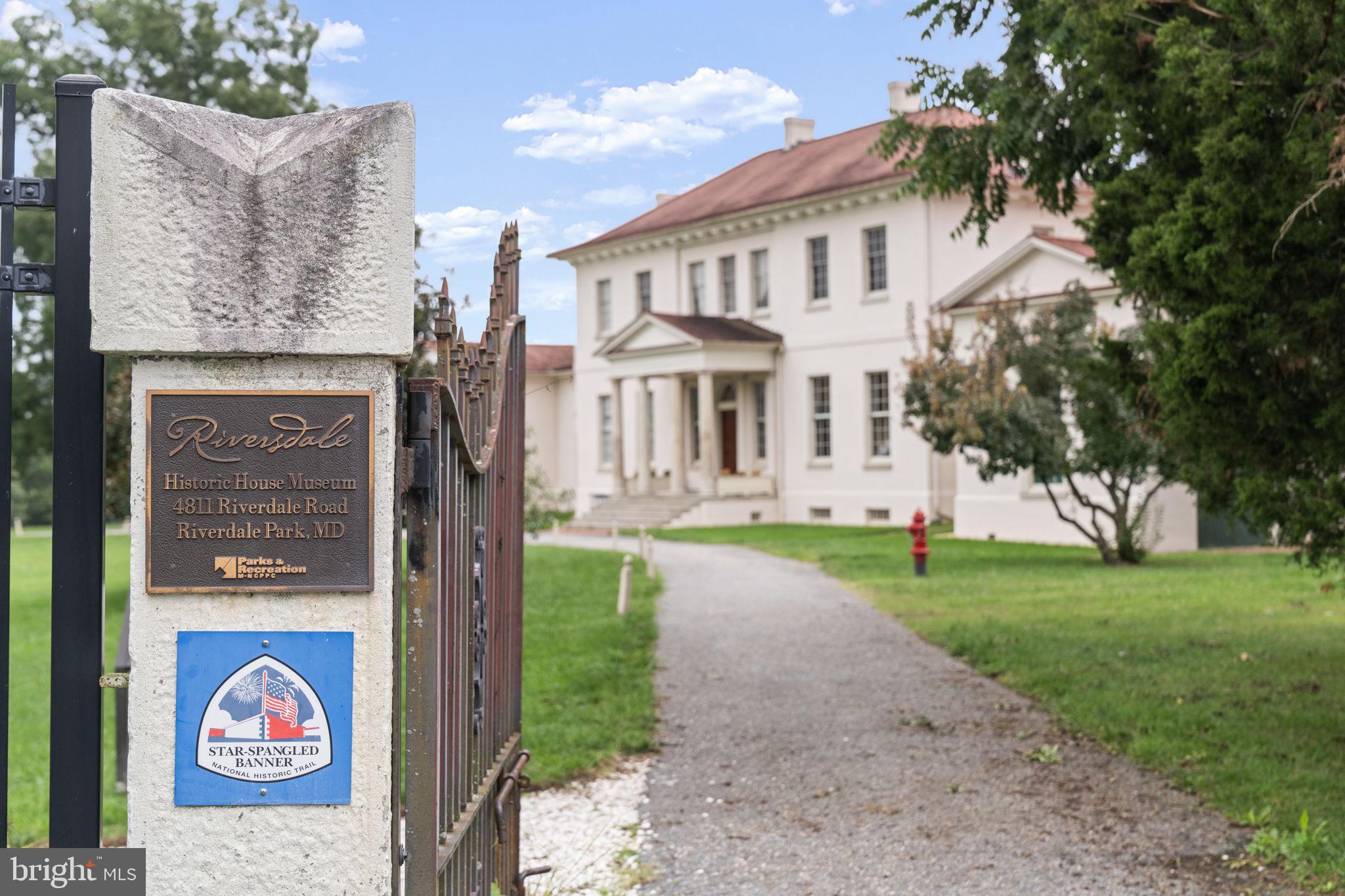 5807 Taylor Road Riverdale, MD 20737 - Photo 52 of 66 a view of a white house with a yard