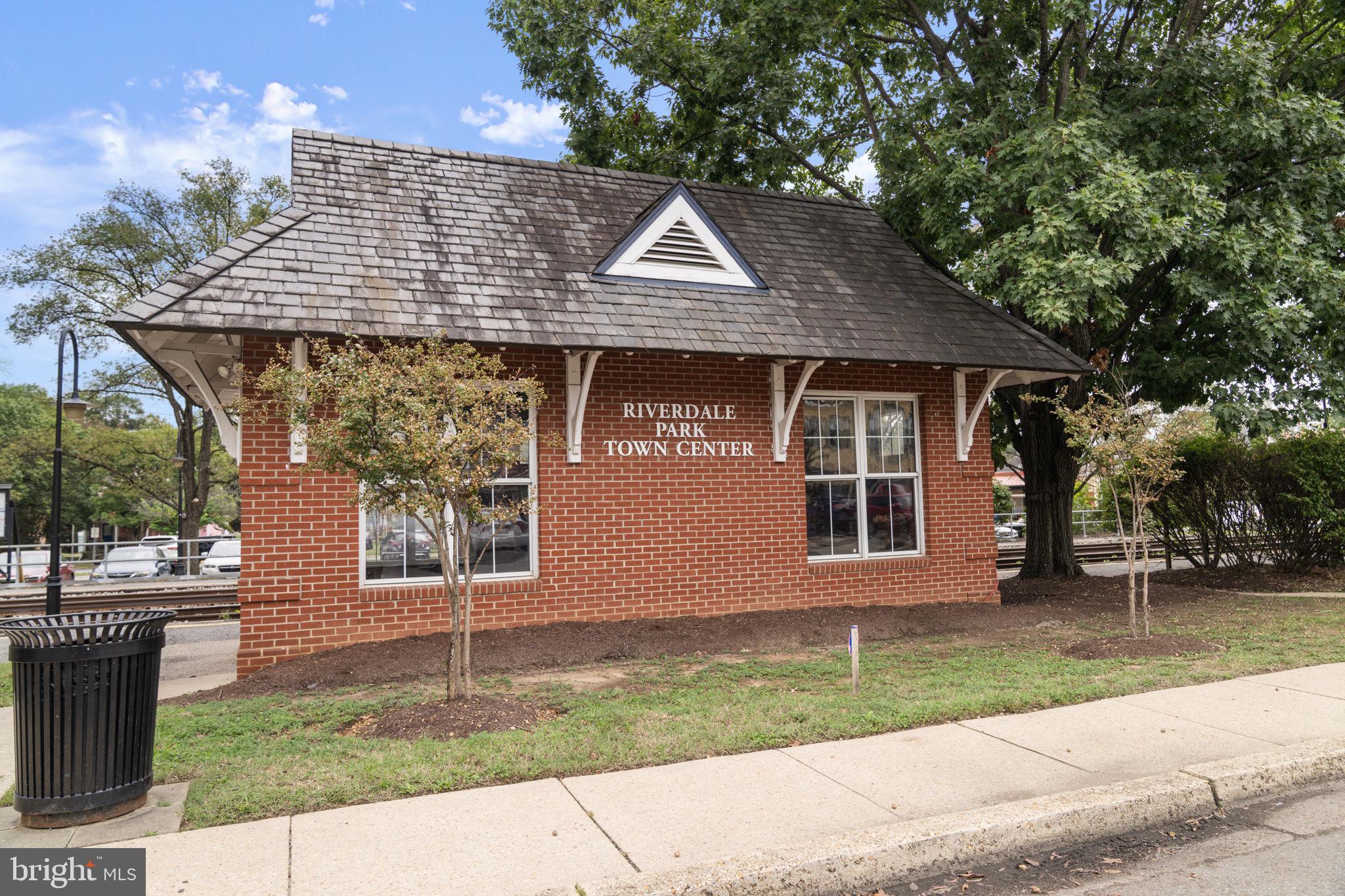 5807 Taylor Road Riverdale, MD 20737 - Photo 55 of 66 a front view of a house with a garden