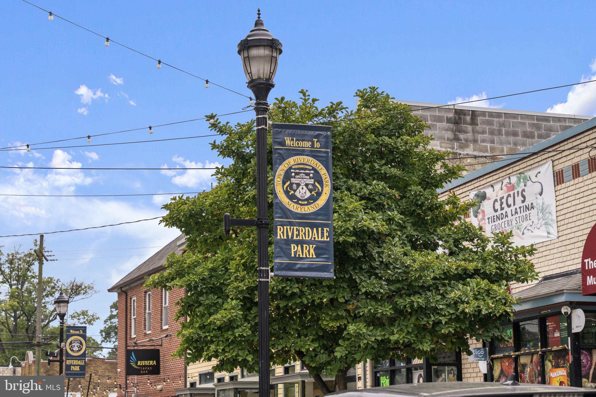 5807 Taylor Road Riverdale, MD 20737 - Photo 57 of 66 a front view of a building with garden and street view