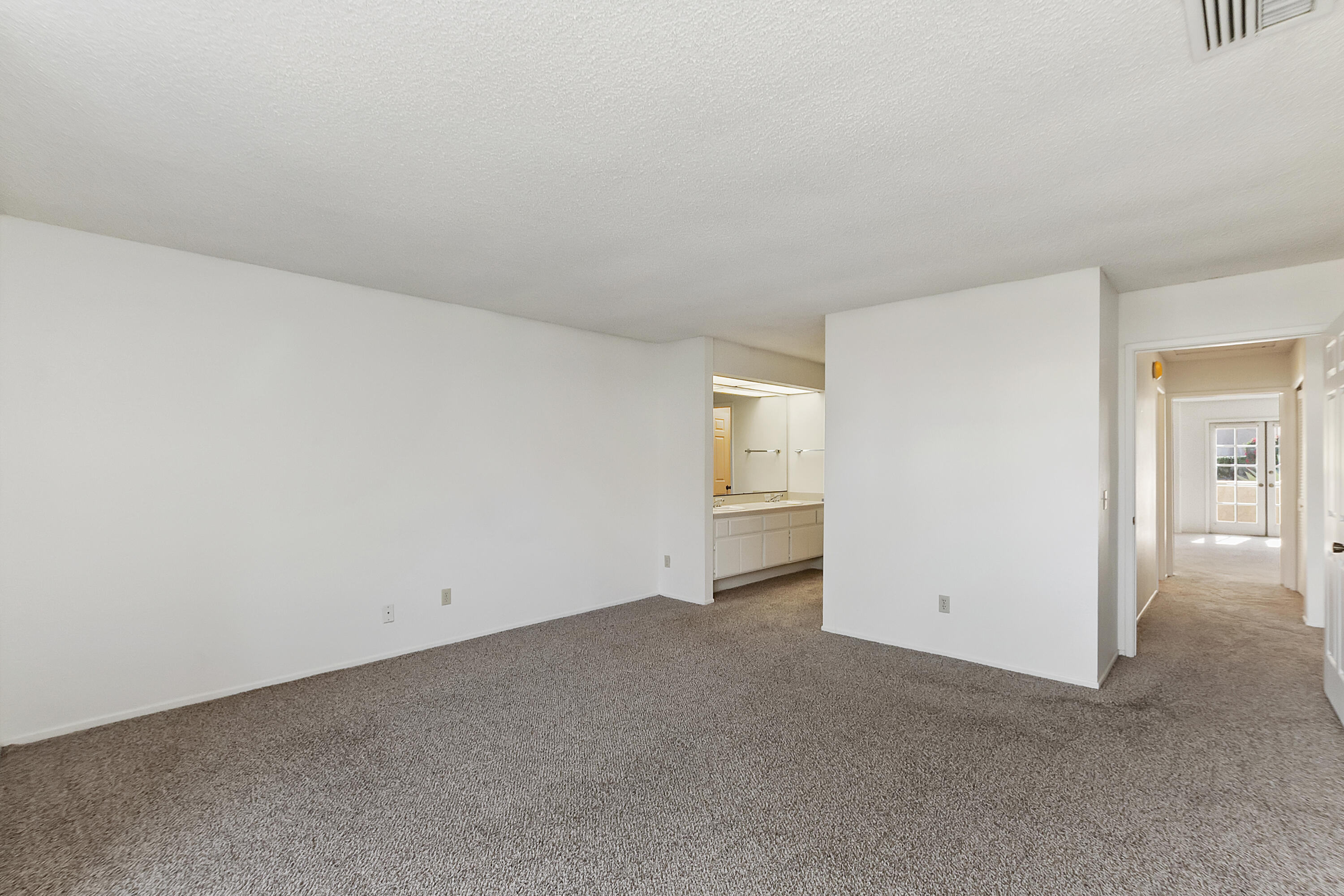 73472 Shadow Mountain Drive Palm Desert, CA 92260 - Photo 18 of 35 a view of an empty room and closet area