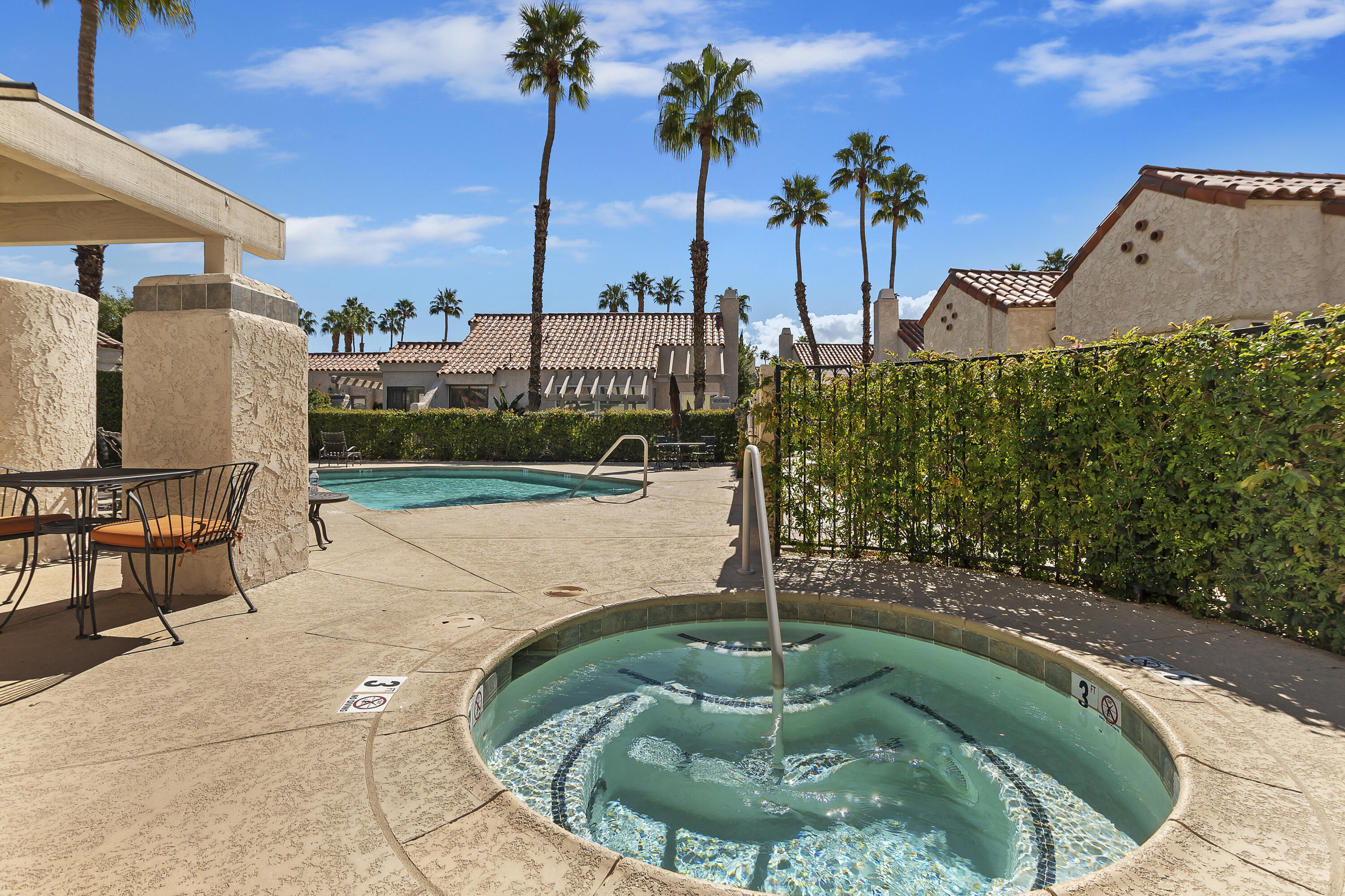 73472 Shadow Mountain Drive Palm Desert, CA 92260 - Photo 34 of 35 a view of a swimming pool with a patio