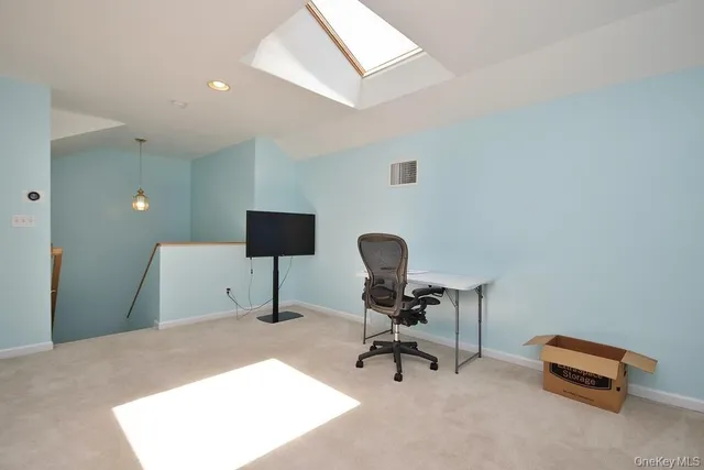 a bedroom with furniture and a bed