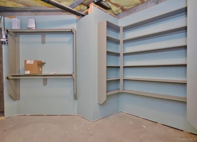 a view of room that has a large window