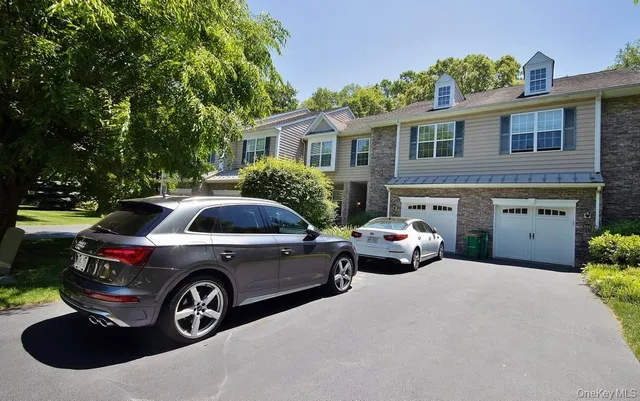a car parked in front of a house