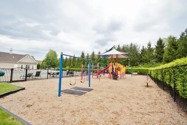 a view of a park with swings