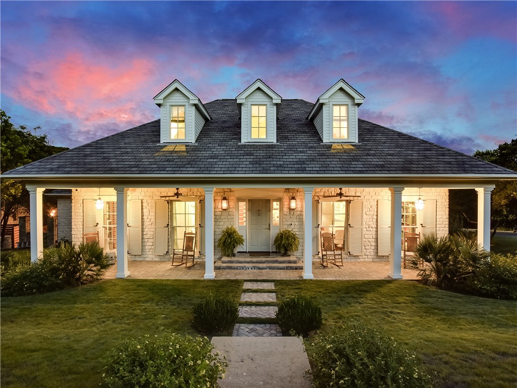 6401 Rusty Ridge Drive Austin, TX 78731 - Photo 1 of 1 a front view of house with yard