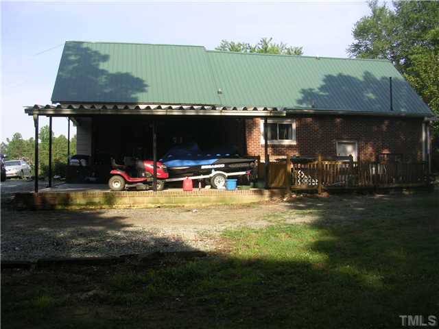 301 Rolling Hills Road Roxboro, NC 27574 - Photo 11 of 16 a view of swimming pool is middle in the garden