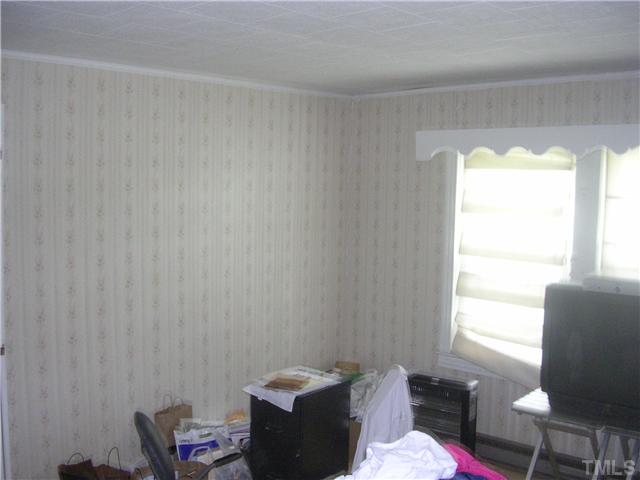 301 Rolling Hills Road Roxboro, NC 27574 - Photo 5 of 16 a living room with furniture and a window