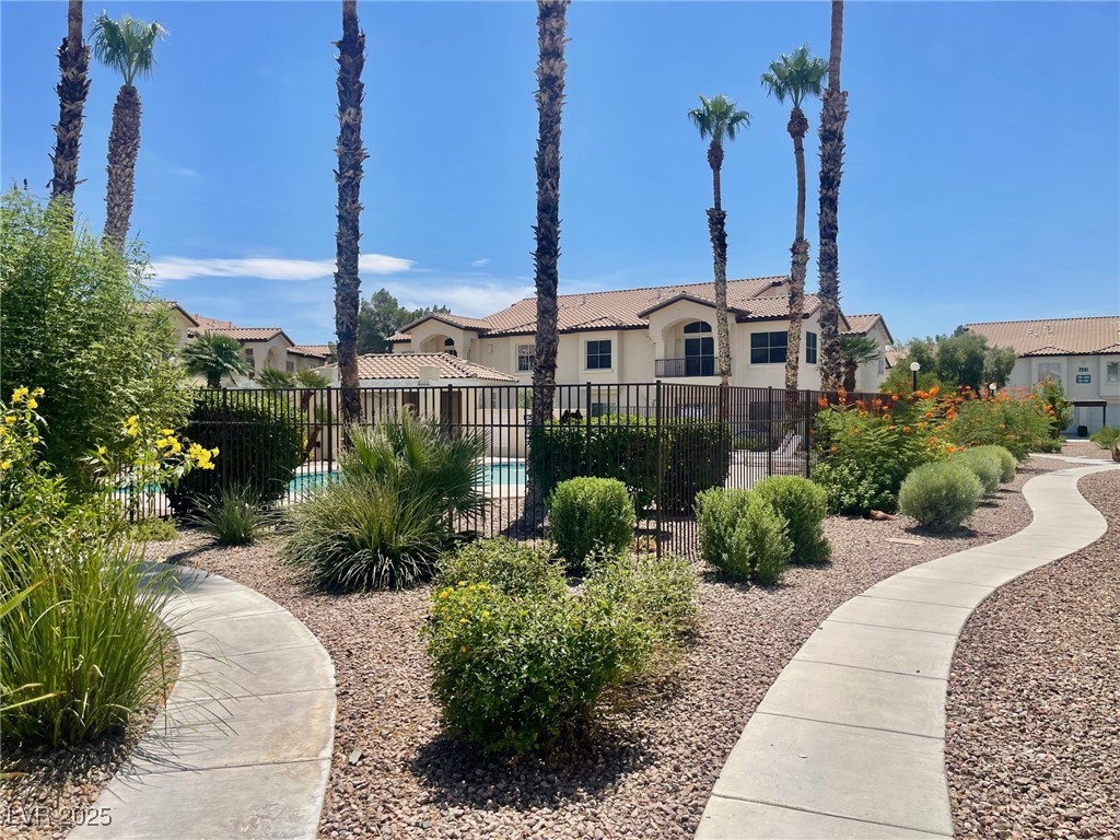 4810 Grey Wolf Lane, Unit 101 Las Vegas, NV 89149 - Photo 6 of 7 View of home's community with a pool