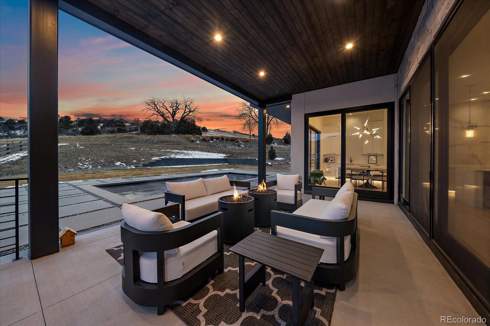 5263 Creation Rock Trail Morrison, CO 80465 - Photo 24 of 50 a outdoor space with patio furniture