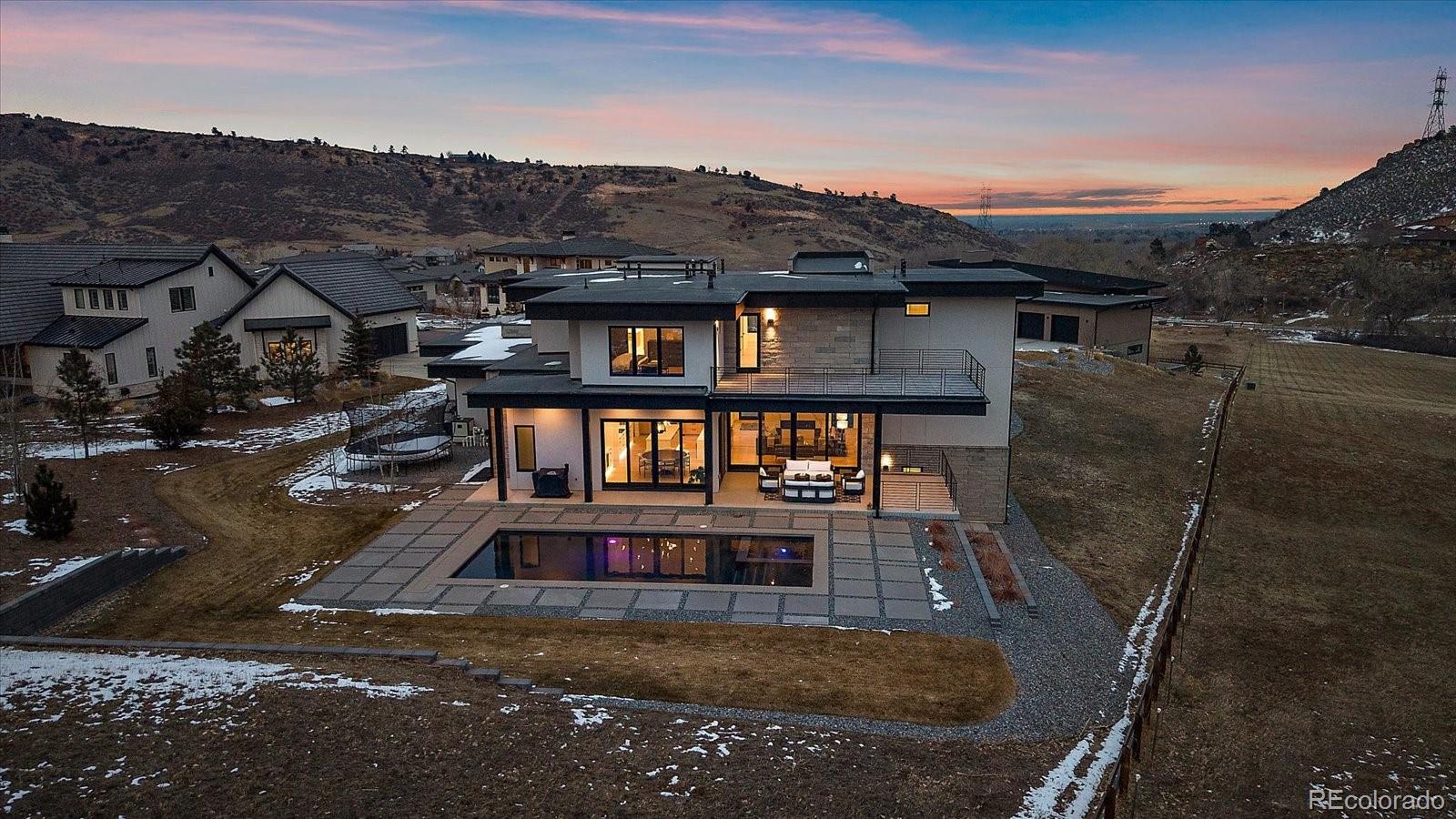 5263 Creation Rock Trail Morrison, CO 80465 - Photo 3 of 50 a view of a house with a small yard