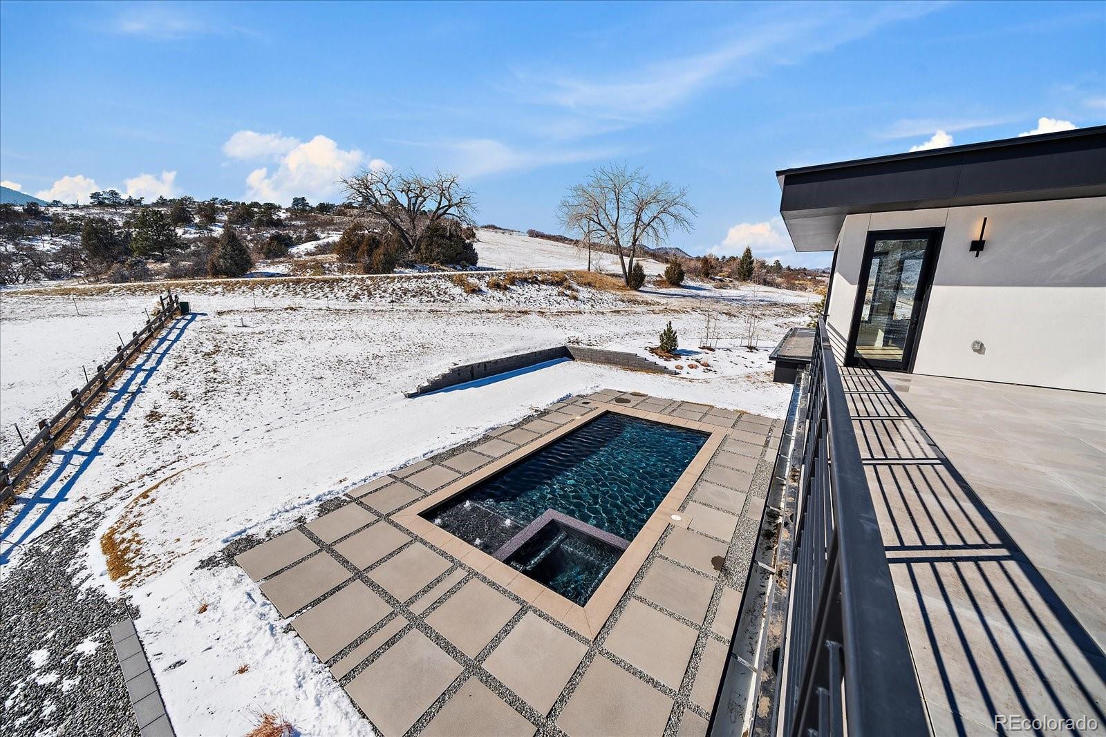 5263 Creation Rock Trail Morrison, CO 80465 - Photo 34 of 50 a view of roof deck with patio