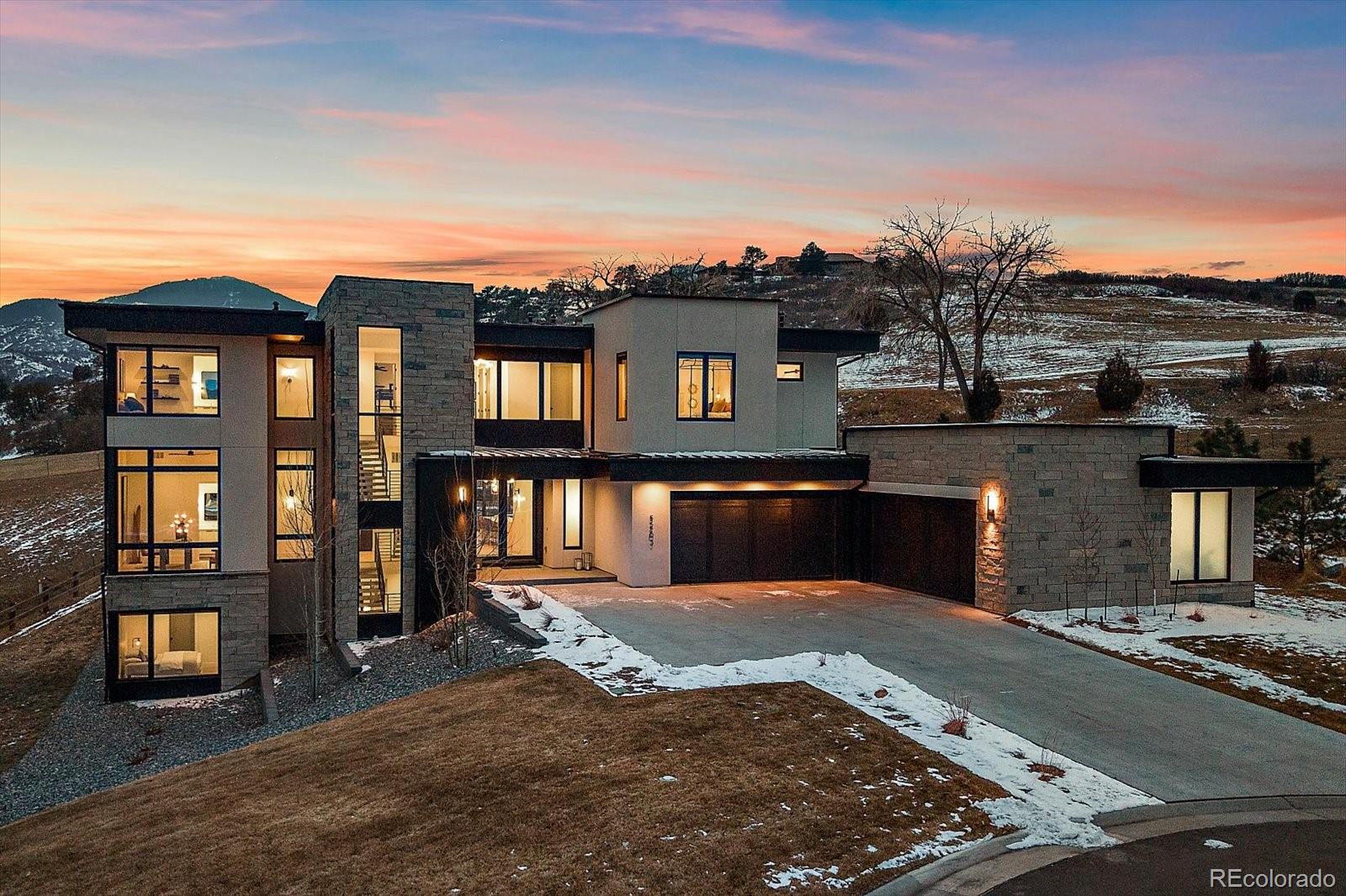 5263 Creation Rock Trail Morrison, CO 80465 - Photo 5 of 50 a front view of a house with a yard