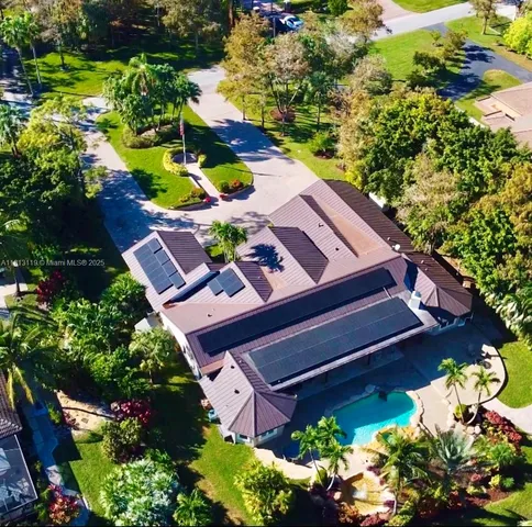 a view of a backyard with sitting area