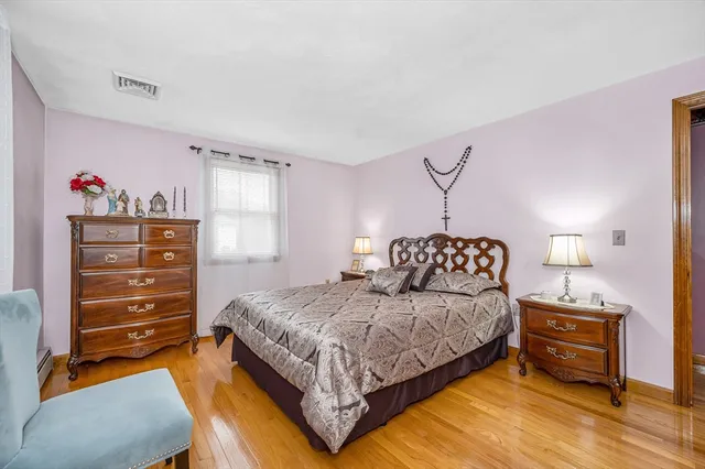 a bedroom with a bed and a closet