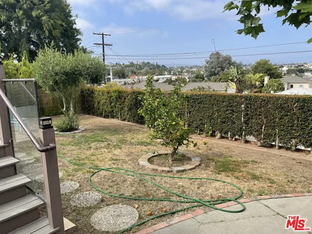 a view of a terrace with chairs