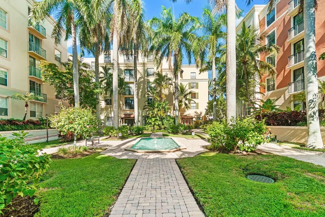 a view of a pathway with a building in the background