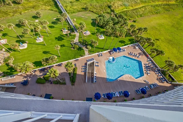 an aerial view of a house with a garden