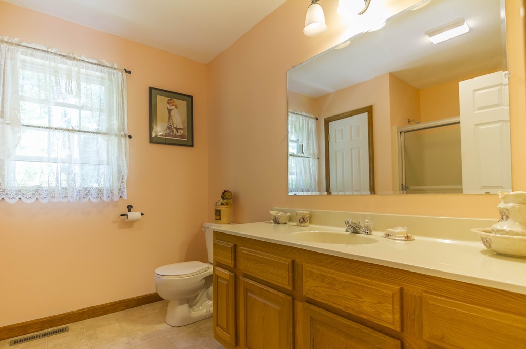 139 Rice Corner Road Brookfield, MA 01506 - Photo 17 of 24 a bathroom with a sink a toilet and shower