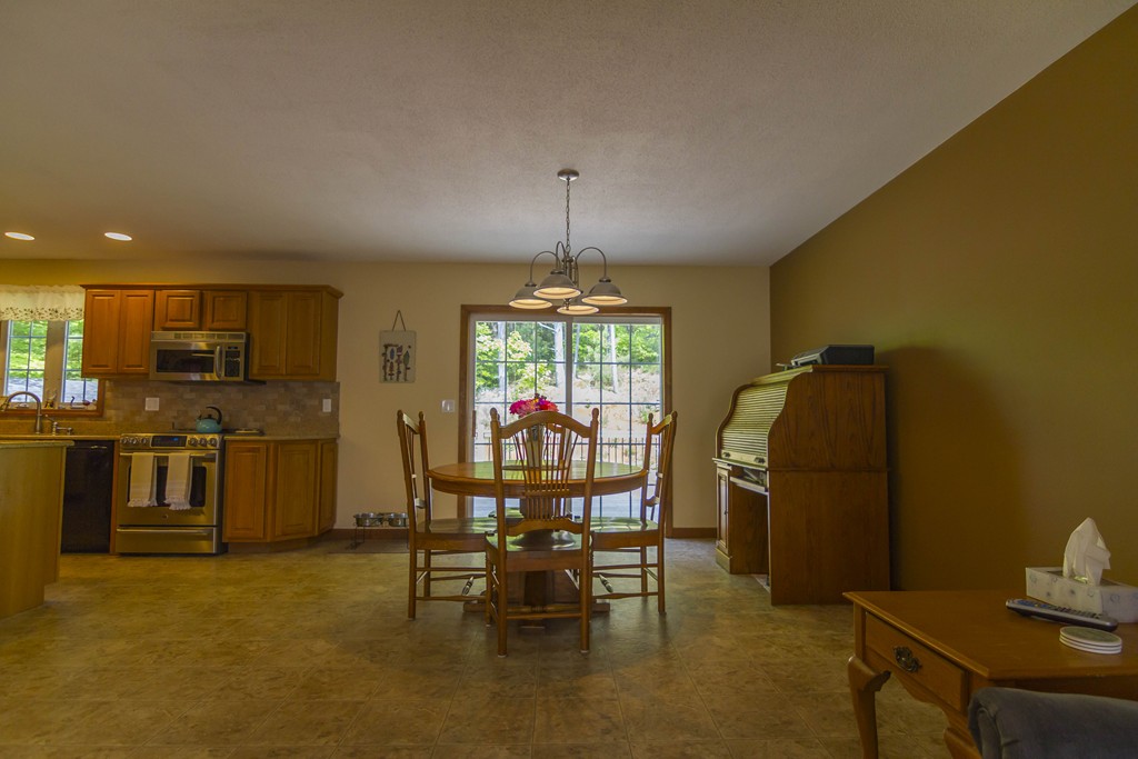 139 Rice Corner Road Brookfield, MA 01506 - Photo 5 of 24 a dining room with furniture and window