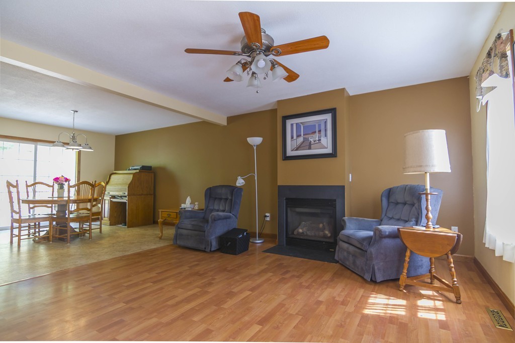139 Rice Corner Road Brookfield, MA 01506 - Photo 10 of 24 a living room with furniture and a fireplace