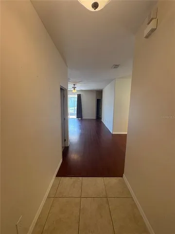 a view of hallway with a window