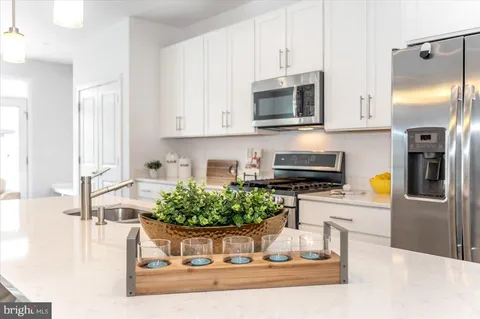 a bedroom with a bed and a shower