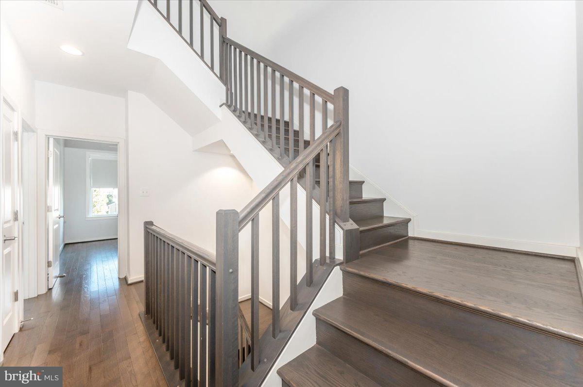 1133 Holden Road Frederick, MD 21701 - Photo 24 of 74 Hardwood staircase to upper level