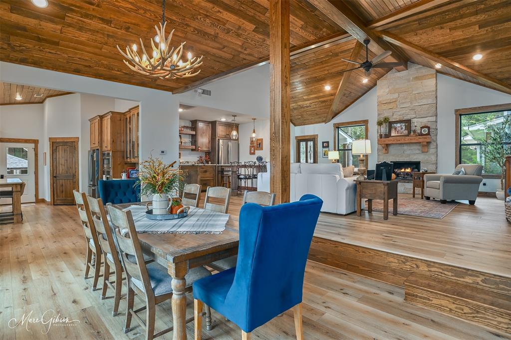 335 Coleman Loop Homer, LA 71040 - Photo 19 of 40 a view of a dining room with furniture a chandelier and wooden floor