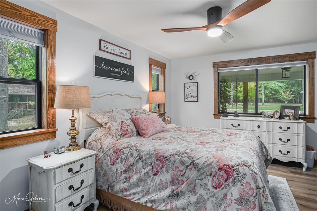 335 Coleman Loop Homer, LA 71040 - Photo 21 of 40 a bedroom with a large bed and a window