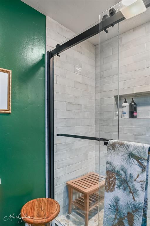 335 Coleman Loop Homer, LA 71040 - Photo 27 of 40 a bathroom with a toilet a sink and mirror