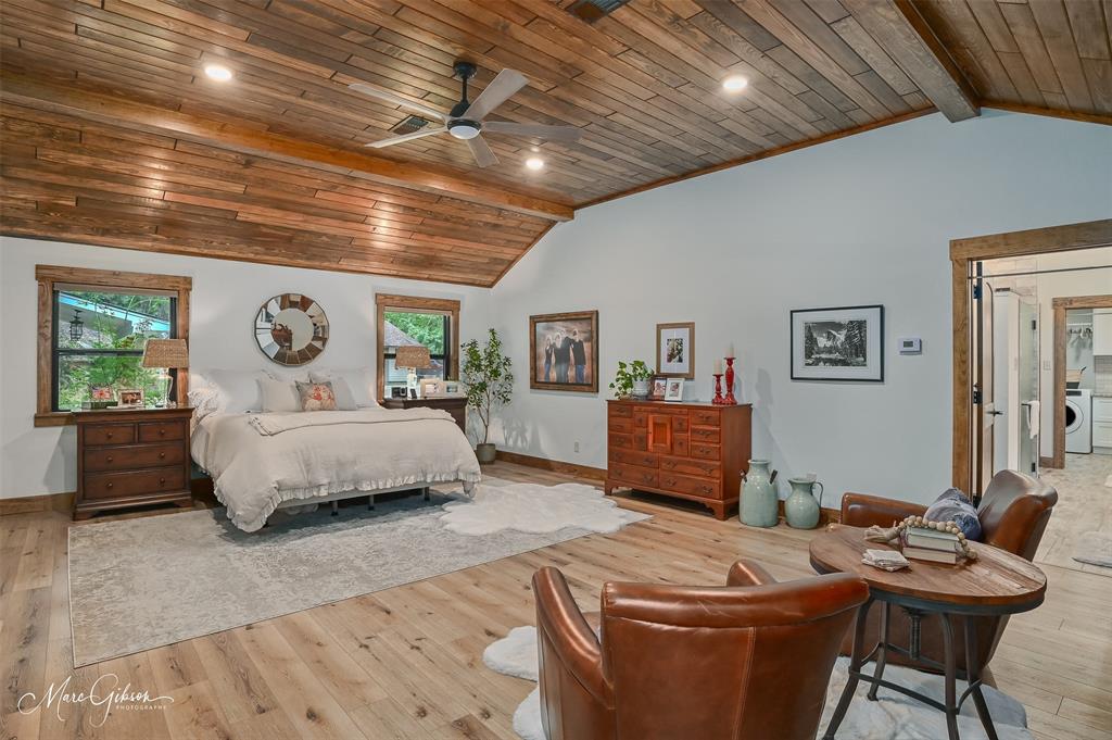 335 Coleman Loop Homer, LA 71040 - Photo 29 of 40 a bedroom with a bed and wooden floor