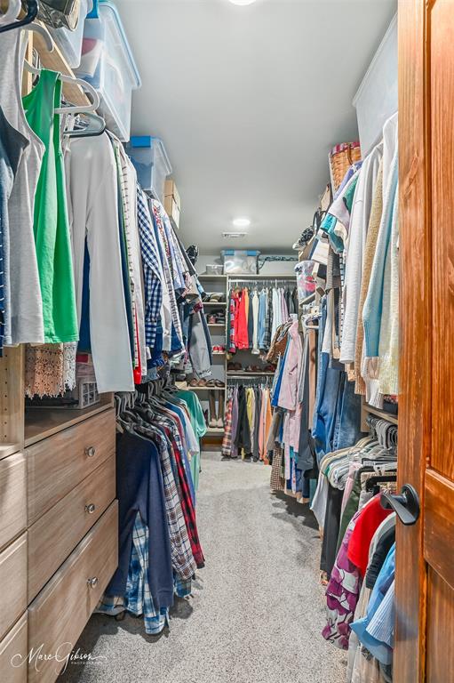 335 Coleman Loop Homer, LA 71040 - Photo 34 of 40 a view of walk in closet with clothes and shoes