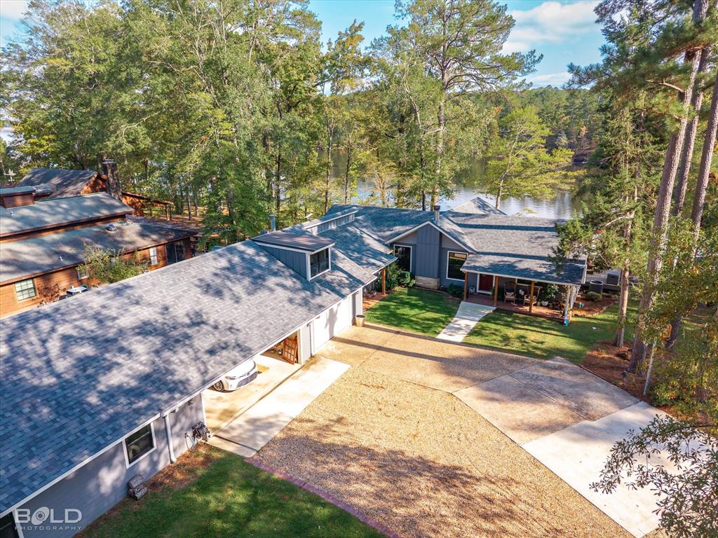 335 Coleman Loop Homer, LA 71040 - Photo 40 of 40 a view of a house with a yard and sitting area